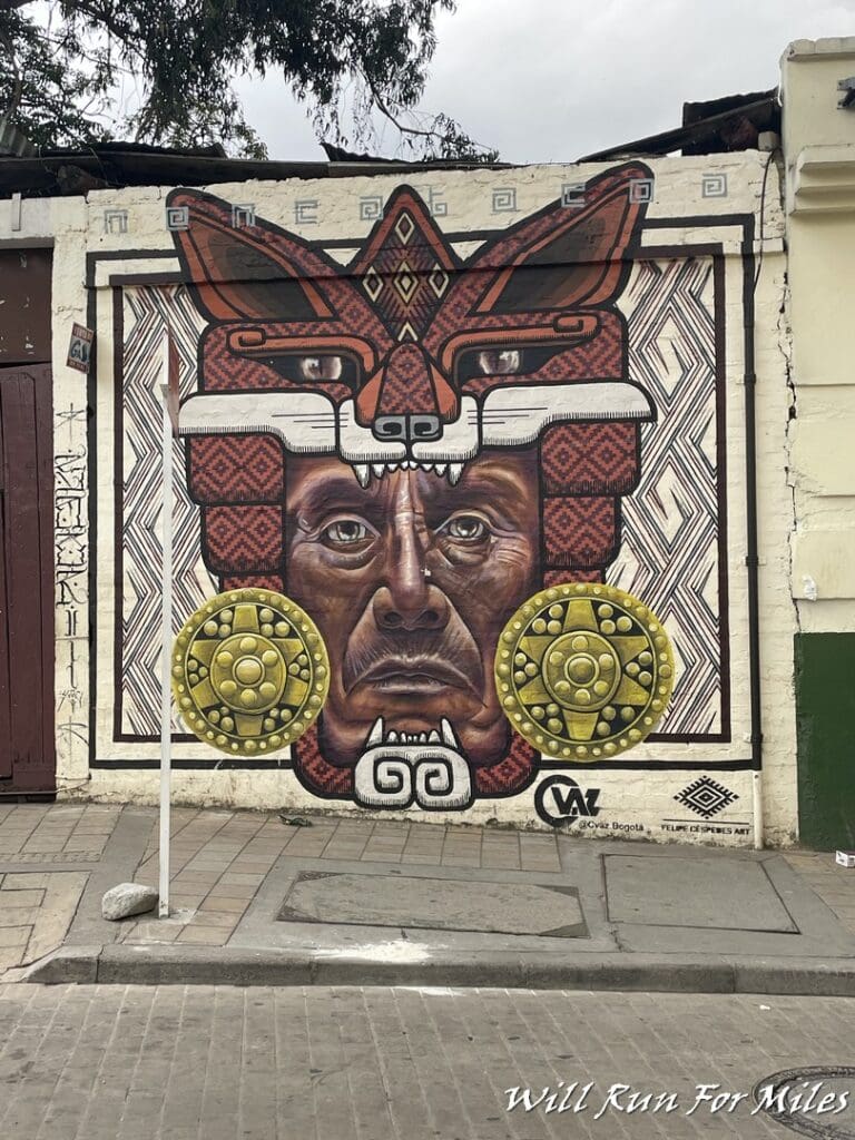 a mural of a man with a mask on a wall