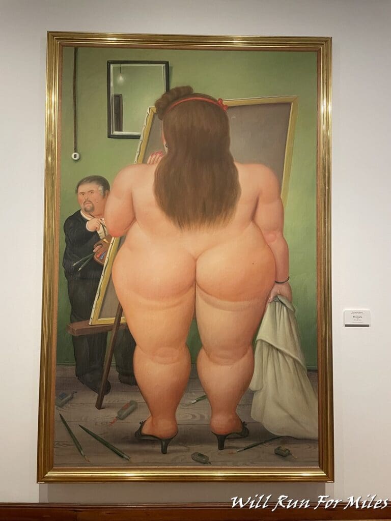 a large painting of a woman