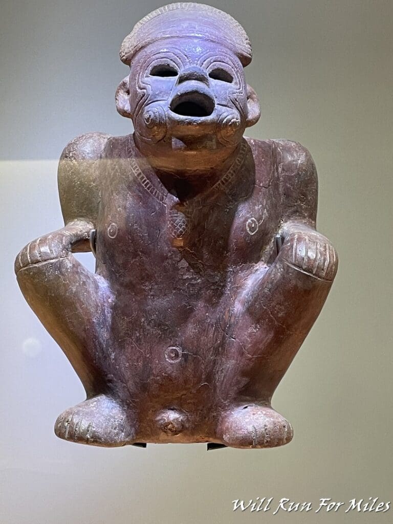 a statue of a man with a crown