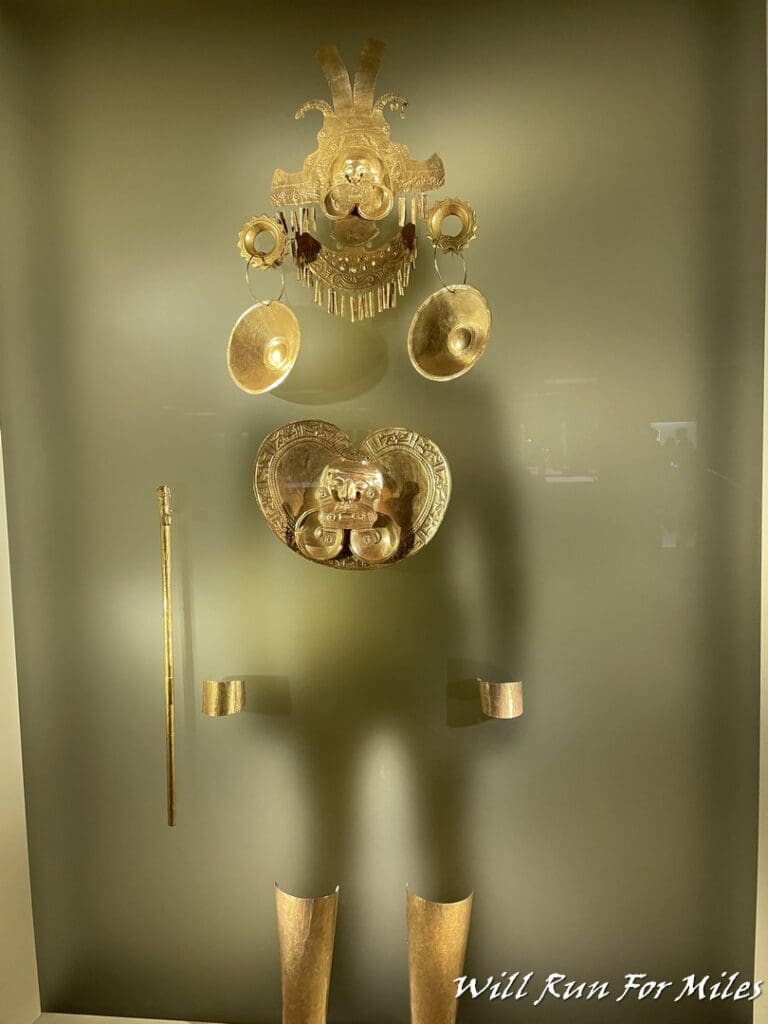 a gold object on a glass surface